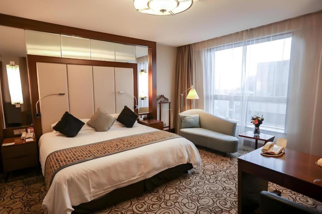 Grand Soluxe Zhongyou Hotel Xangai Exterior foto