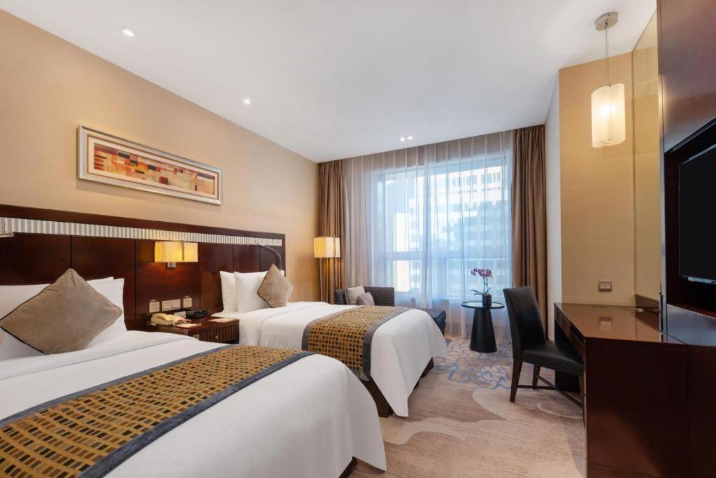 Grand Soluxe Zhongyou Hotel Xangai Exterior foto