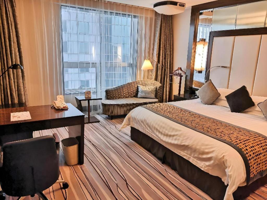 Grand Soluxe Zhongyou Hotel Xangai Exterior foto
