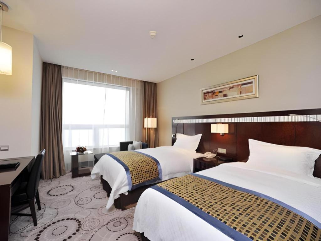 Grand Soluxe Zhongyou Hotel Xangai Exterior foto