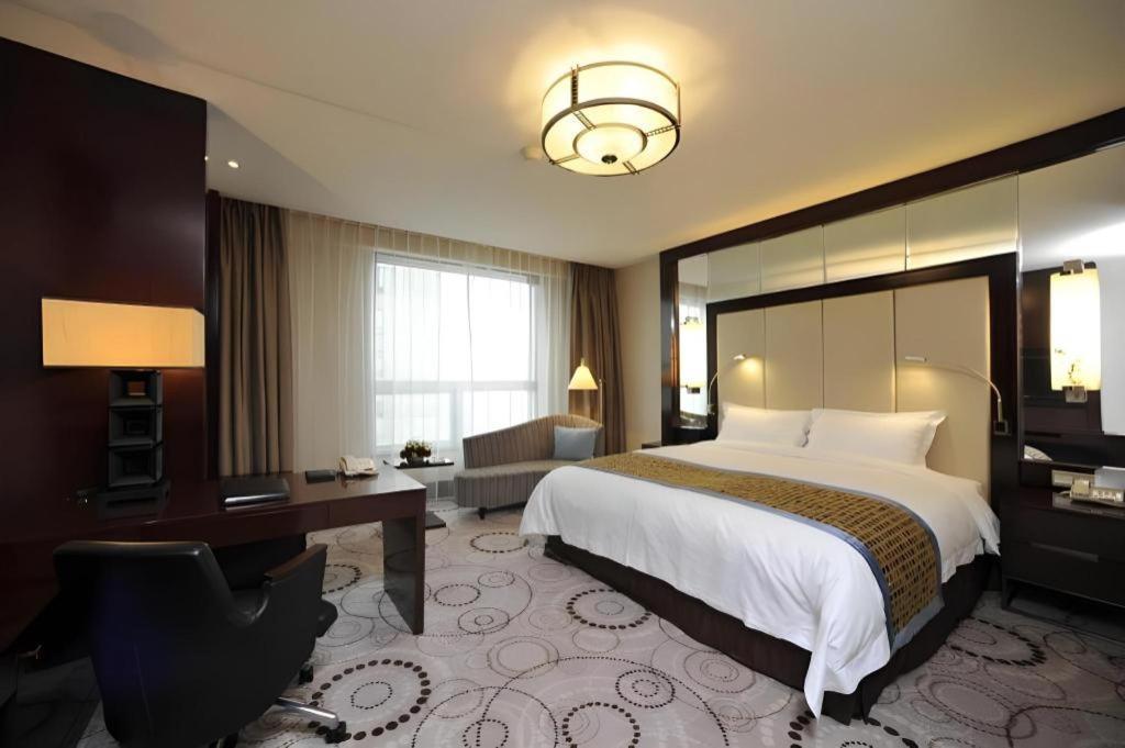 Grand Soluxe Zhongyou Hotel Xangai Exterior foto