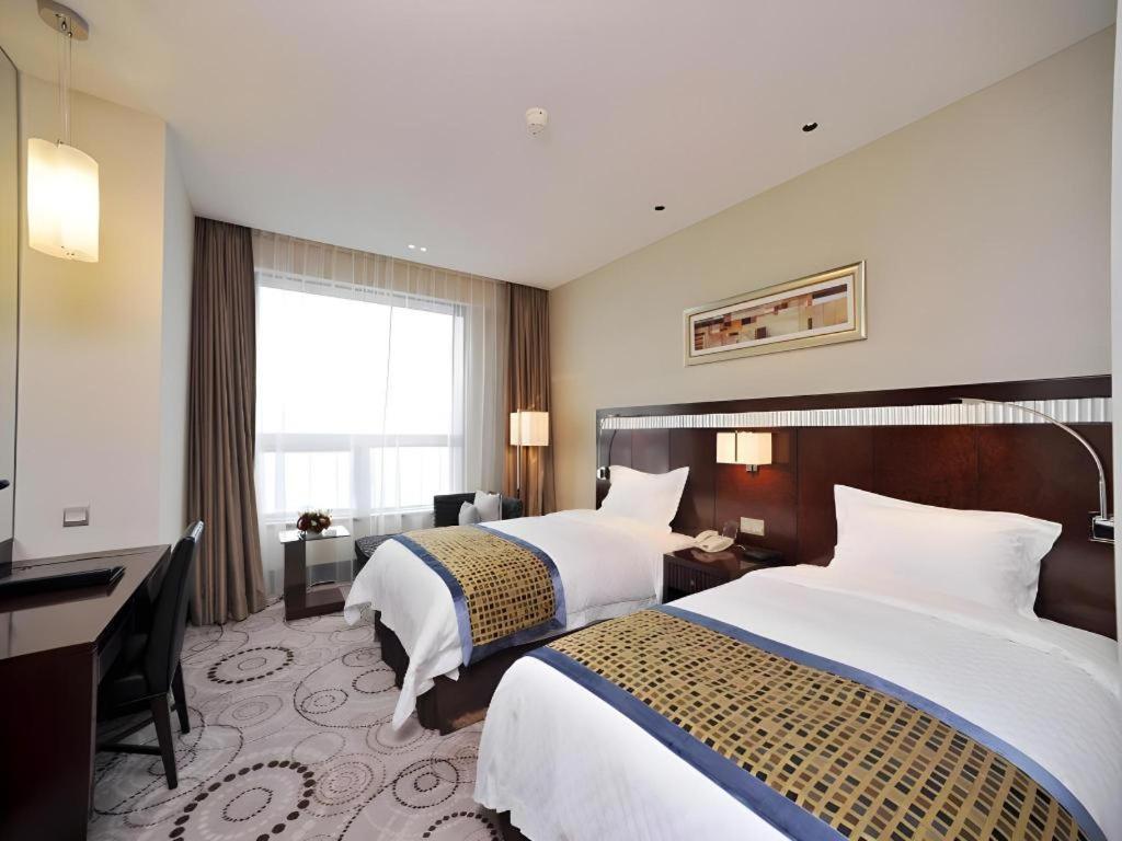 Grand Soluxe Zhongyou Hotel Xangai Exterior foto