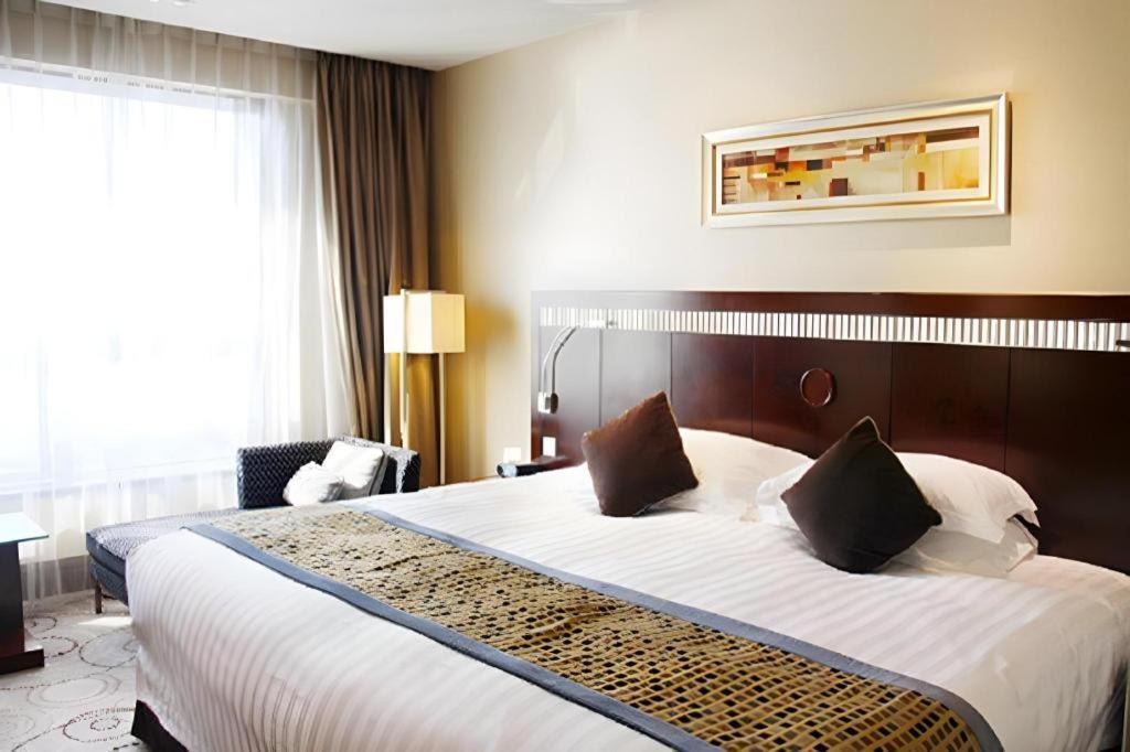 Grand Soluxe Zhongyou Hotel Xangai Exterior foto
